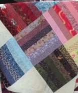 One piece of fabric of every fabric I owned at the time of making this quilt