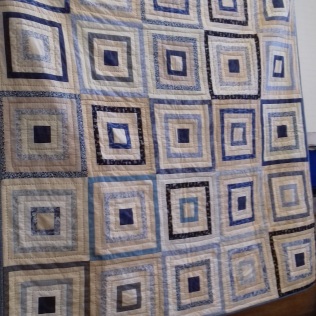 Annette's Log Cabin in the Round quilt for herself
